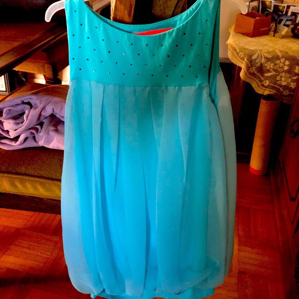 Beautiful baby-blue Girls dress.  Chiffon like material.  A Fancy dress!